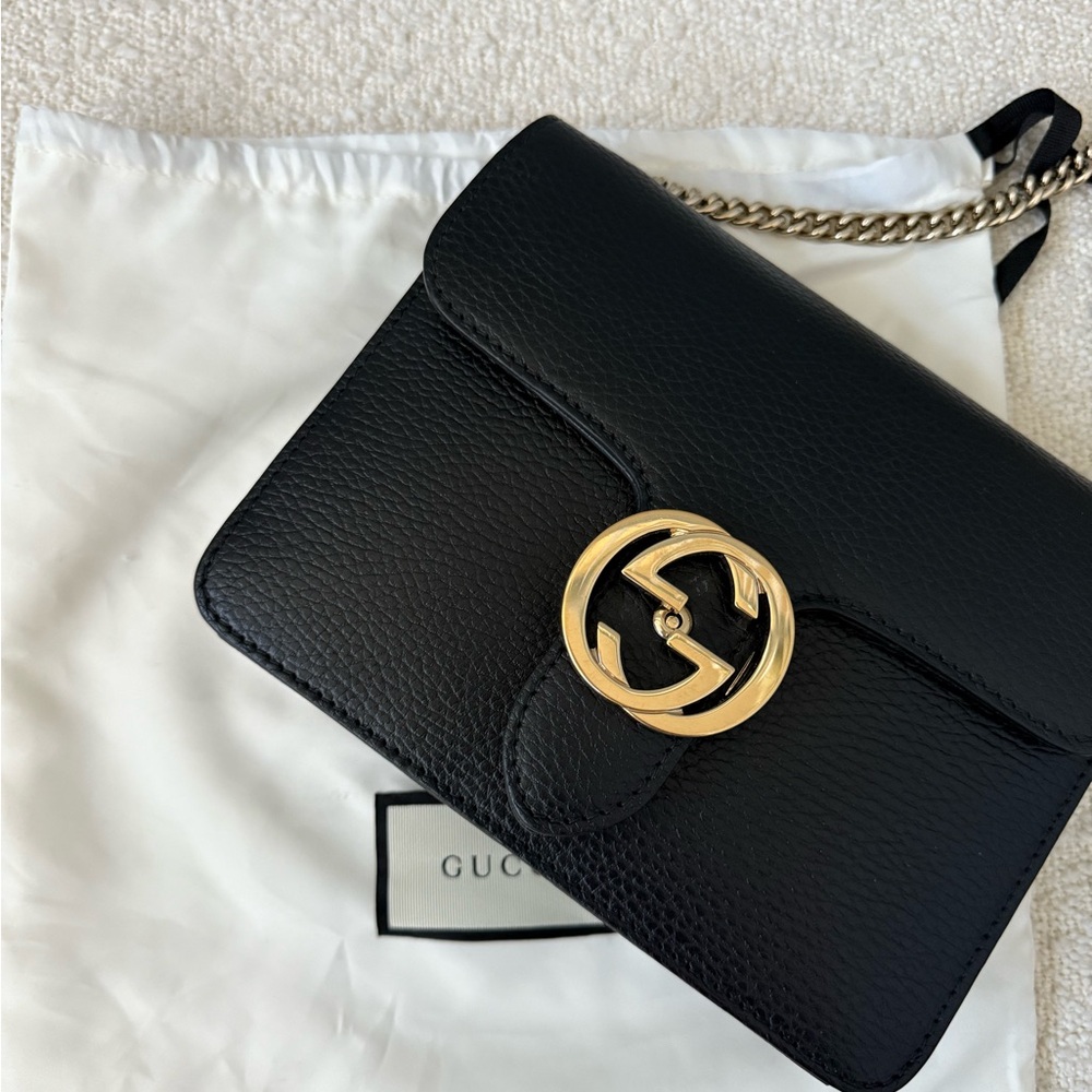 Gucci Black and Gold Crossbody Bag with Iconic GG Logo